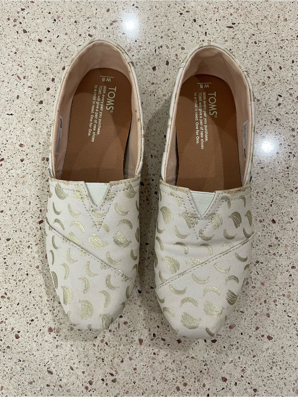 TOMS Cream Slip-On Flats with Gold Crescent Print